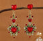 Aretes de corazon largos y piedras rojas
