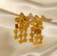 Maxi Aretes dorados de estrellas con diseño colgante
