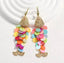 Aretes de peces con escamas