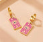 Aretes en placa con ojos y lunas