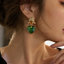 Aretes con cristal verde corazón