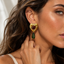 Aretes Corazón Dorado con Gota Esmeralda