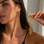 Maxi Aretes largos dorados con nudo