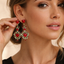 Aretes de corazon largos y piedras rojas