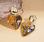 Aretes  Corazón Dorado con Piedras