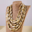 Collar de cuentas ovaladas en tonos marfil