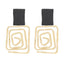 Aretes Geométricos Negro y Dorado