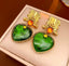 Aretes con cristal verde corazón