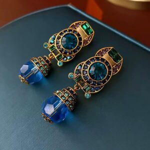 Aretes de piedras azules y broche de clip