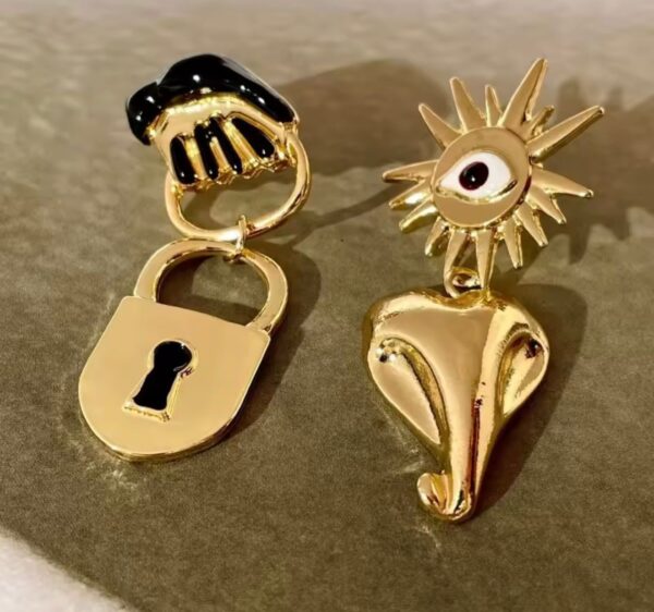 Aretes asimetricos de ojo y candado - Image 2
