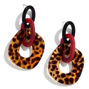 Aretes geométricos animal print con detalles en rojo y negro