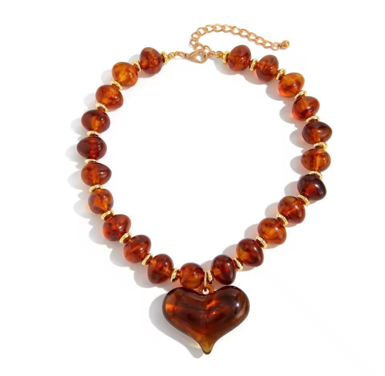 Collar de cuentas ámbar con dije de corazón